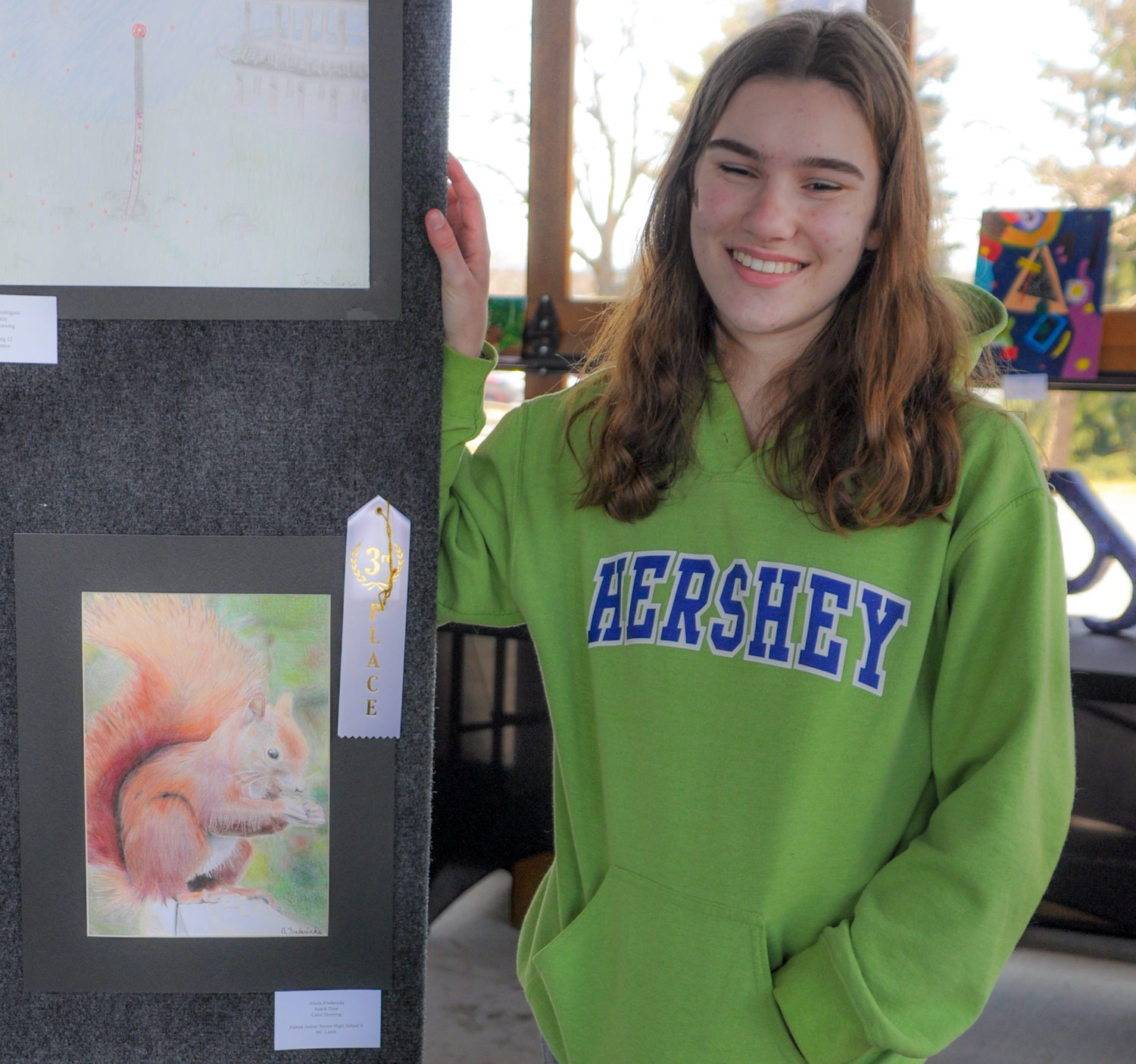 While attending the Sullivan County Visual Art Show, I was fortunate enough to run into Eldred Jr./Sr. High School artist Alexis Fredericks, seen here with here with her award-winning piece, "Snack Time."